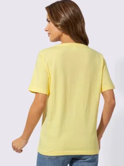 Blouse à manches courtes avec dentelle florale centrale et col rond