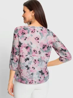 Blouse fluide à fleurs avec encolure ronde et manches trois quart
