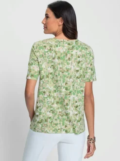 Blouse fluide à manches courtes et motifs floraux