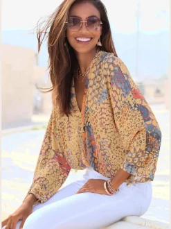 Blouse viscose douce à manches larges et col en V dégagé
