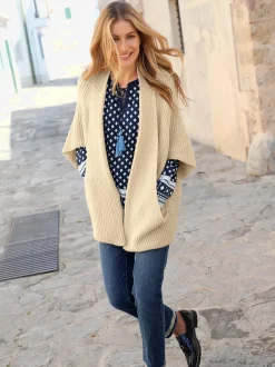 Cardigan oversize en maille coupe ouverte et poches