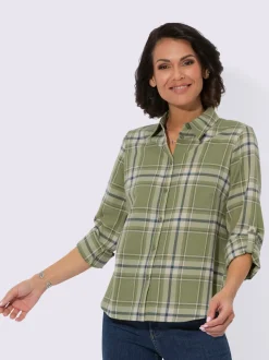 Chemisier en flanelle à carreaux col chemise et manches retroussées