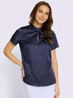 Chemisier en satin volants au col