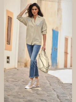 Jean en denim extensible coupe régulière avec poches avant et arrière