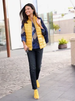 Jean femme coupe slim en denim stretch et poches arrière