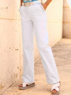Jean à jambes larges en coton avec œillets et rivets décoratifs