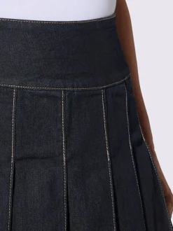 Jupe en jean petite glissière latérale avec bouton