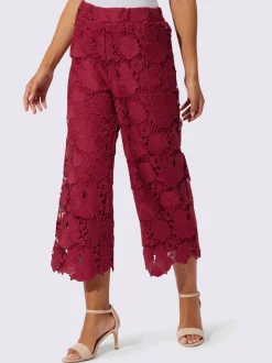 Pantalon en dentelle à motif floral et ourlet scallé
