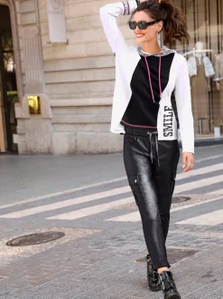 Pantalon en synthétique longueur chevilles avec ceinture élastique et cordon