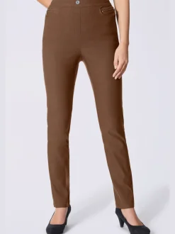 Pantalon extensible et sobre avec poches zippées et ceinture élastique
