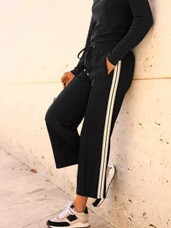 Pantalon large en jersey à rayures latérales