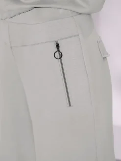 Pantalon large en mélange modal avec poche zippée devant