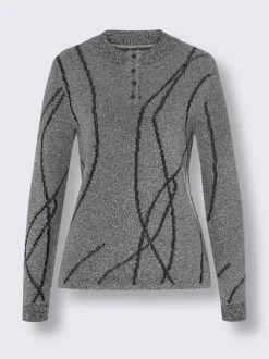 Pull bouclé doux à motif jacquard graphique et manches longues