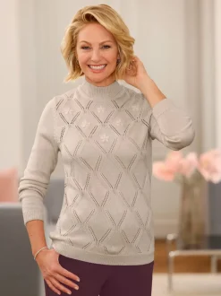 Pull à col montant broderie florale