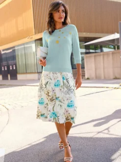 Pull encolure ronde application florale