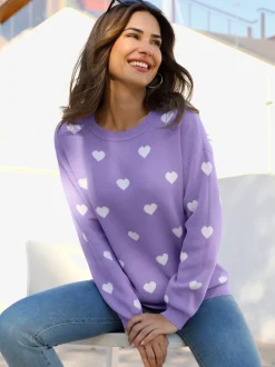 Pull à manches longues col rond en coton avec motifs cœurs