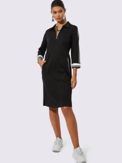 Robe polo col et manches trois quart poches zippées bords rayés