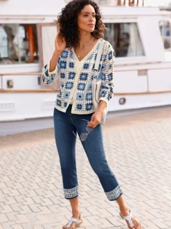 Veste en tricot aspect crochet