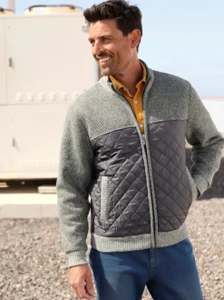 Veste en tricot avec empiècements matelassés