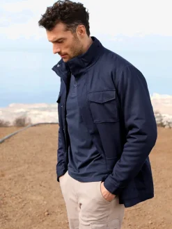 Veste longue nombreuses poches pratiques